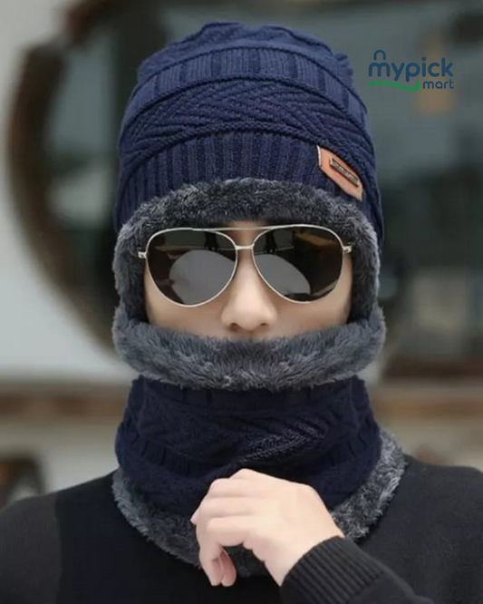 Person wearing a navy blue knit hat and scarf with sunglasses, brand 'mypick' visible.