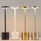 Four standing lamps with different color finishes on a neutral background mypickmart