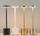 Four standing lamps with different color finishes on a neutral background mypickmart